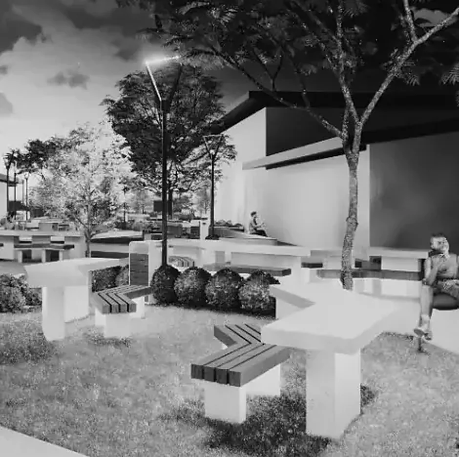 Parque con mobiliario urbano, plaza nocturna, fachada con celosía y recepción acristalada.